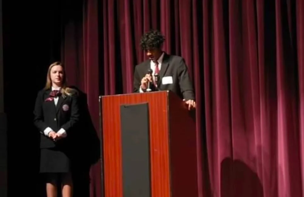 Youth speech event at podium
