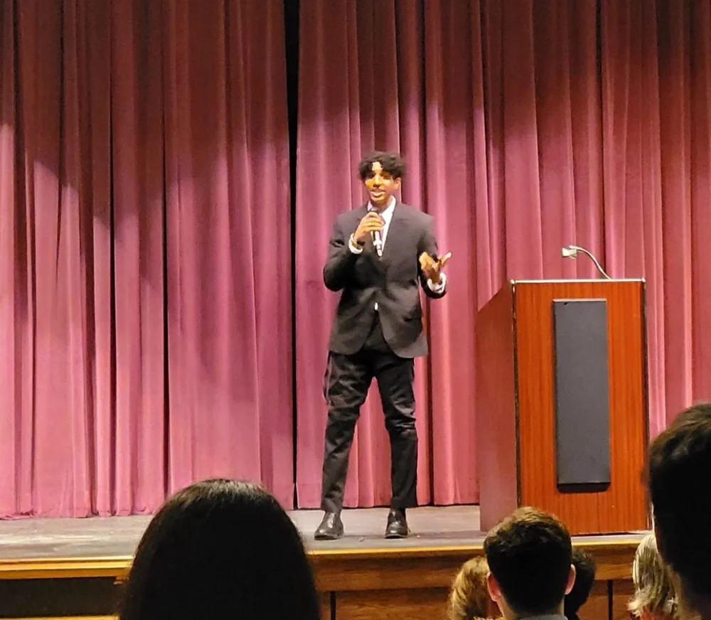 Speaking on stage