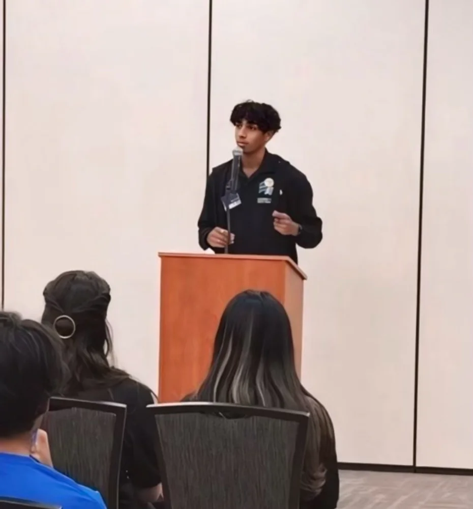 Youth participant at podium